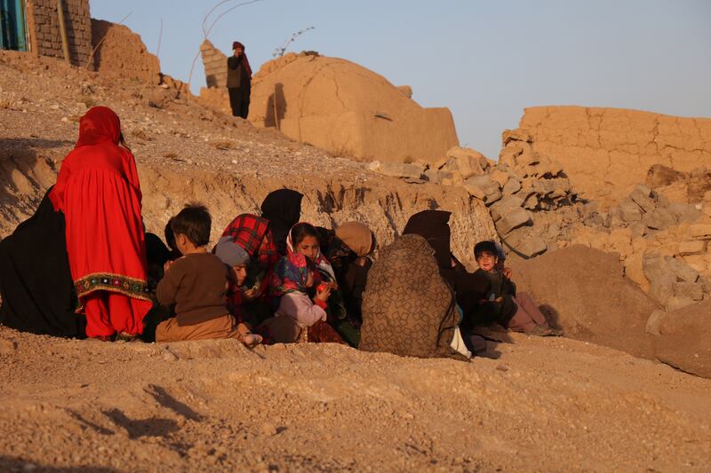 People affected by an earthquake wait for relief in Herat, Afghanistan. EPA