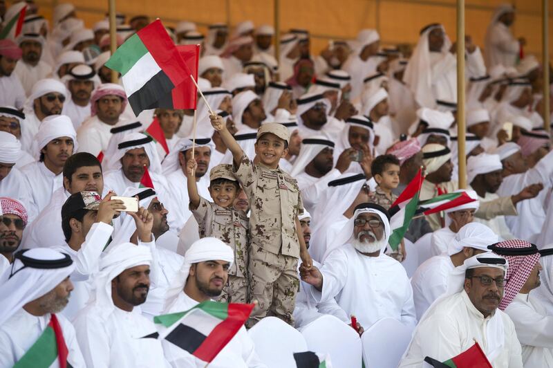 ZAYED MILITARY CITY, ABU DHABI, UNITED ARAB EMIRATES - November 28, 2017: Guests attend the graduation ceremony of the 8th cohort of National Service recruits and the 6th cohort of National Service volunteers at Zayed Military City. 
( Naeem Al Zaabi for the Crown Prince Court - Abu Dhabi )
---