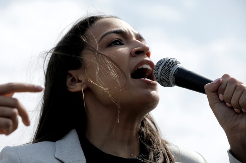 Democrat Alexandria Ocasio-Cortez represents New York's 14th district. Taking office at age 29, Ms Ocasio-Cortez is the youngest woman ever to serve in the US Congress. EPA