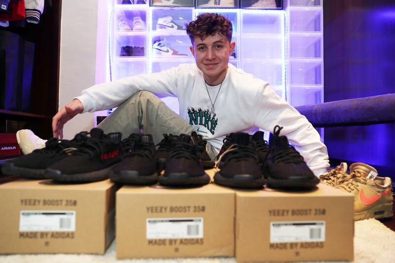 Kevin Ghassemi, 17, who collected trainers as a hobby, has started his own business in Dubai reselling shoes. All photos: Pawan Singh / The National
