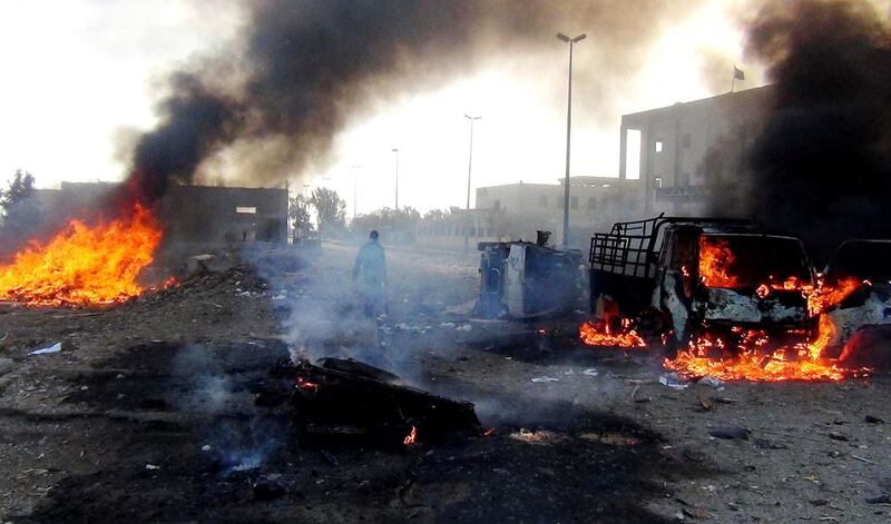 An airstrike by Syrian government forces in the ISIL-controlled city of Raqa in Syria on November 25, 2014 killed at least 95 people. AFP Photo