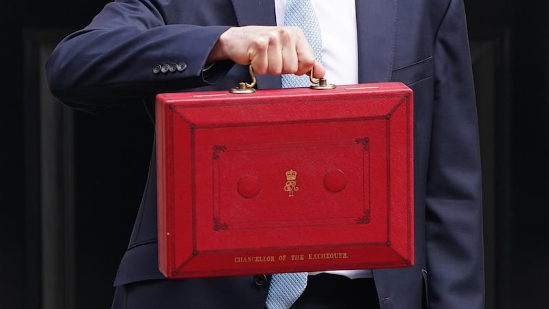 Mr Hunt presents his ministerial box to the media. PA
