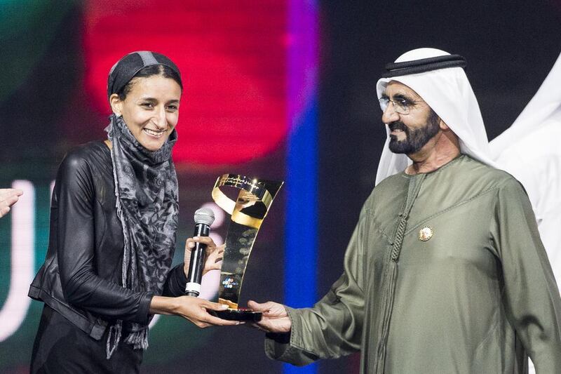 The winner of last year's Arab Hope Maker award, Nawal Al Sufi, was presented the award by Sheikh Mohammed bin Rashid, Vice President and Ruler of Dubai, for her work with refugees in Italy. Reem Mohammed / The National