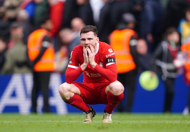 Liverpool's Andrew Robertson at the final whistle. PA 