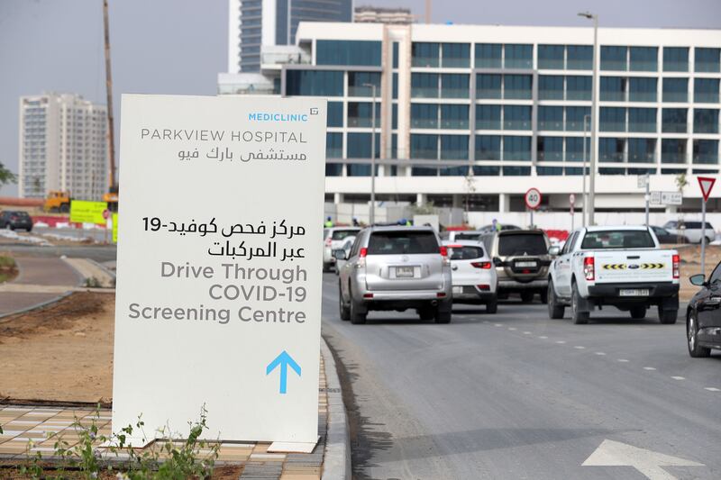 Queues outside Parkview Hospital Covid-19 testing facility in Dubai. Chris Whiteoak / The National