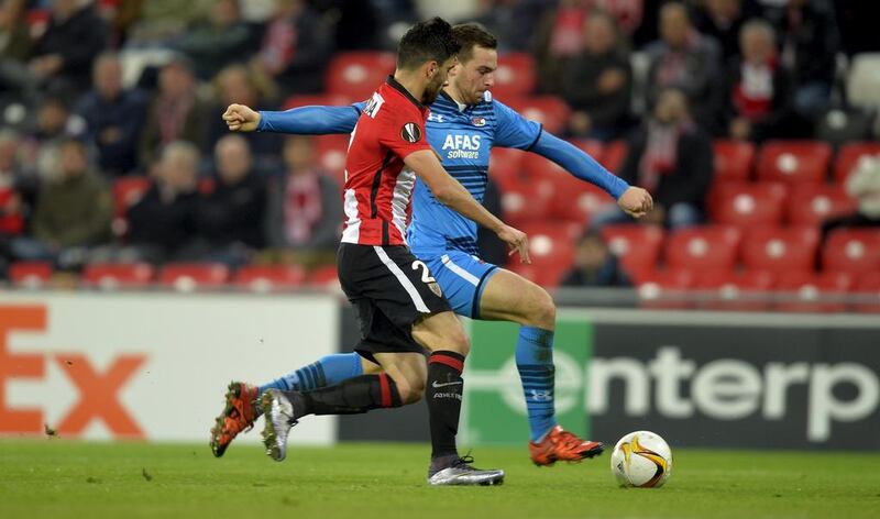 Athletic Bilbao's Eneko Boveda, left, in action against AZ Alkmaar's Vincent Janssen. Vincent West  / Reuters