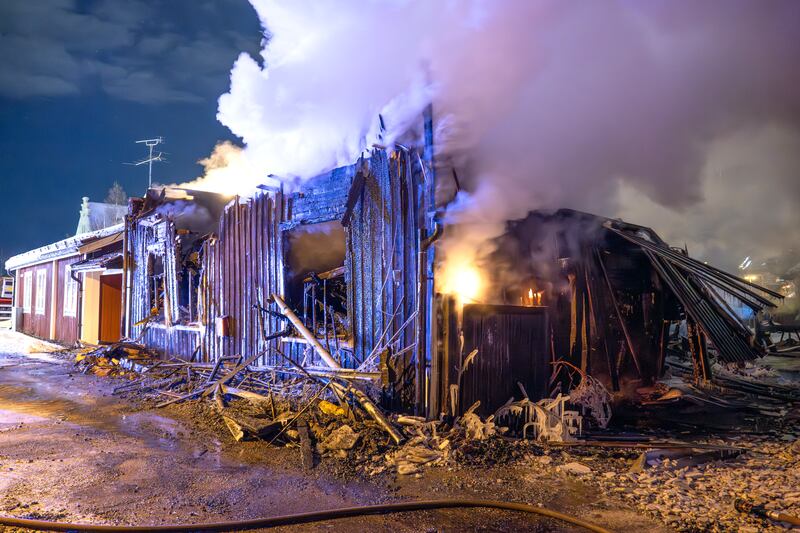 A wooden house on fire in the Unesco-listed cultural quarter Elsborg, in the city of Falun, Sweden. EPA