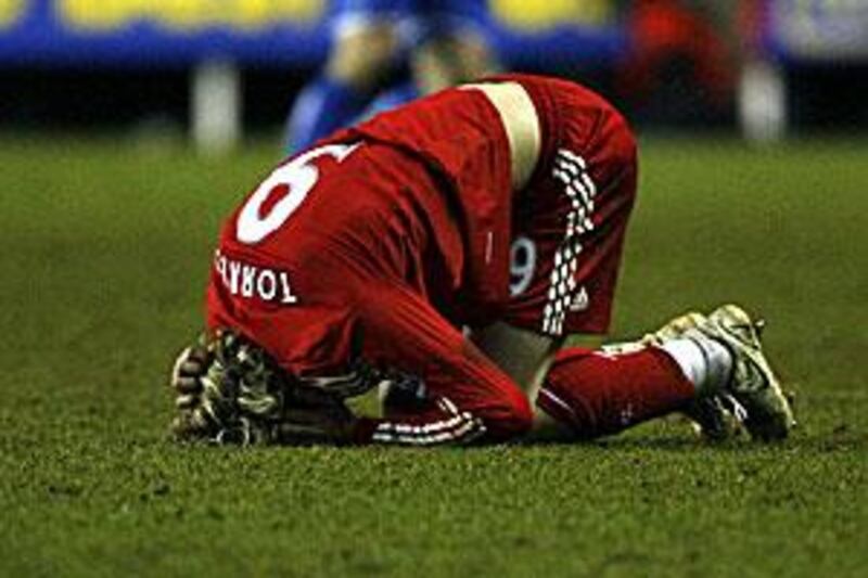 Fernando Torres, Liverpool's Spanish forward, shows his frustration during the third-round tie at Reading earlier this month.