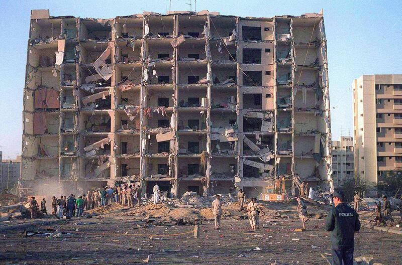 FILE PHOTO: Investigators inspect the Khobar Towers military complex after an attack in Khobar, Saudi Arabia in June 1996.  Dept.of Defense/Handout/File Photo via REUTERS.  ATTENTION EDITORS - THIS IMAGE WAS PROVIDED BY A THIRD PARTY