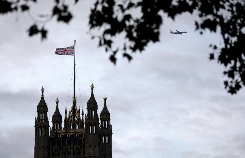A Union flag flies from a pole atop the Victoria Tower at the Houses of Parliament in London on October 9, 2019. Brexit talks between Britain and the European Union teetered on the brink of collapse on Tuesday, with tit-for-tat claims of intransigence and sabotage before an end of October deadline. / AFP / ISABEL INFANTES
