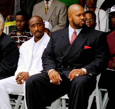 Shakur, left, and the founder of Death Row Records, Marion 'Suge' Knight, at a voter registration event in Los Angeles in 1996. AP