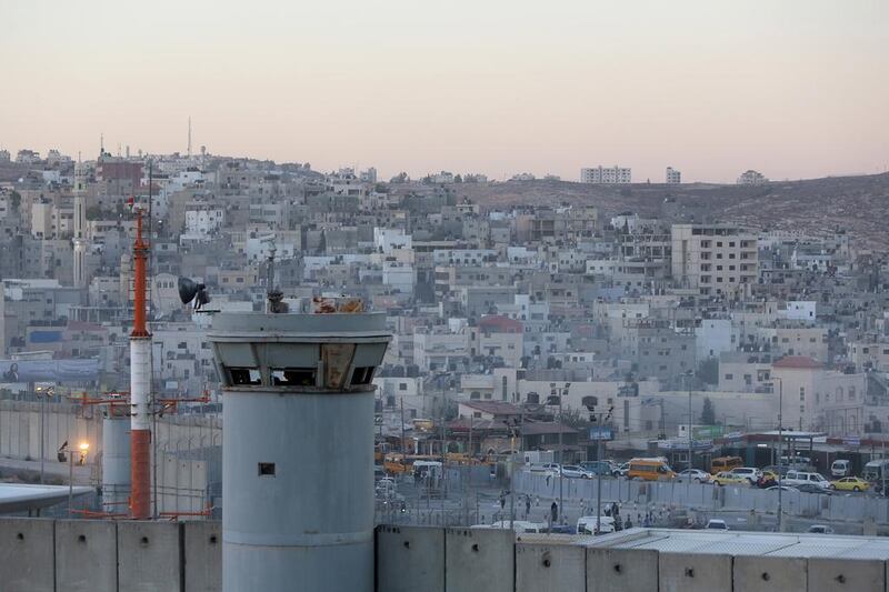 Israel’s separation wall isolates Ramallah from Jerusalem. Fadi Arouri for The National




