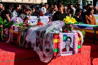 Mourners attend a funeral, for Kurdish political leader Hevrin Khalaf and others including civilians and Kurdish fighters, in the northeastern Syrian Kurdish town of Derik, known as Al Malikiyah in Arabic, on October 13, 2019. AFP