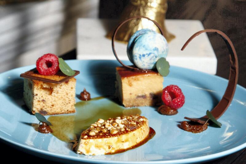 Three-way date cake at Cafe Society is a platter of three desserts – a date cheesecake, a date cake and bavarois with a honey date glaze and walnut praline.