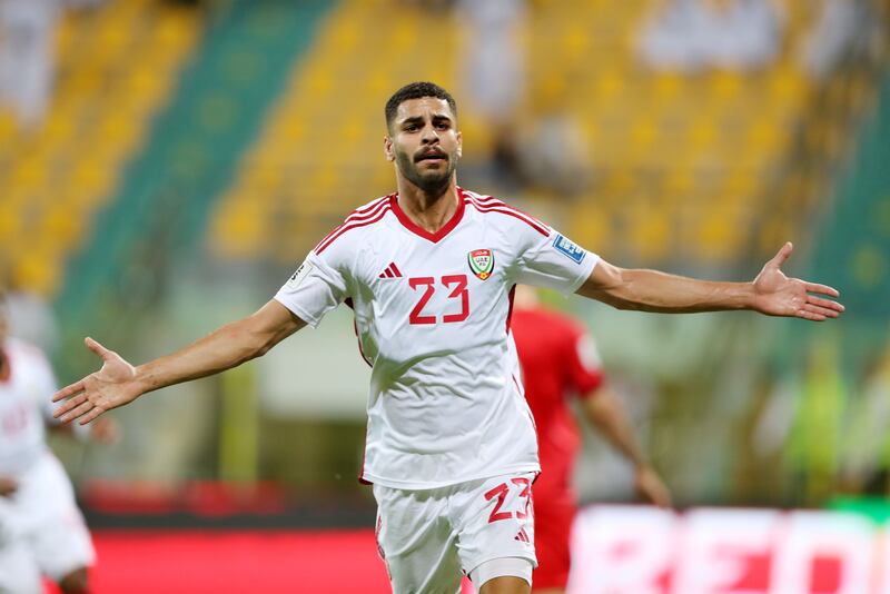 Sultan Adil celebrates after scoring the equaliser for the UAE against Bahrain. 
