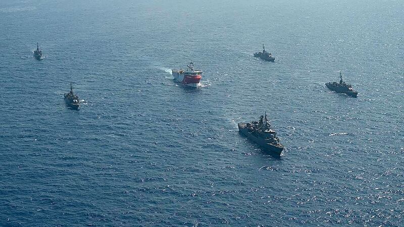 This handout photograph released by the Turkish Defence Ministry on August 12, 2020, shows Turkish seismic research vessel 'Oruc Reis' (C) as it is escorted by Turkish Naval ships in the Mediterranean Sea, off Antalya on August 10, 2020.  Greece on August 11, demanded that Turkey withdraw a research ship at the heart of their growing dispute over maritime rights and warned it would defend its sovereignty, calling for an emergency meeting of EU foreign ministers to resolve the crisis. Tensions were stoked August 10, when Ankara dispatched the research ship Oruc Reis accompanied by Turkish naval vessels off the Greek island of Kastellorizo in the eastern Mediterranean.
 - RESTRICTED TO EDITORIAL USE - MANDATORY CREDIT "AFP PHOTO /TURKISH DEFENCE MINISTRY " - NO MARKETING - NO ADVERTISING CAMPAIGNS - DISTRIBUTED AS A SERVICE TO CLIENTS
 / AFP / TURKISH DEFENCE MINISTRY / - / RESTRICTED TO EDITORIAL USE - MANDATORY CREDIT "AFP PHOTO /TURKISH DEFENCE MINISTRY " - NO MARKETING - NO ADVERTISING CAMPAIGNS - DISTRIBUTED AS A SERVICE TO CLIENTS
