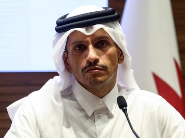 Qatar's Prime Minister and Foreign Minister Sheikh Mohammed bin Abdulrahman al-Thani gives a press conference with his Turkish counterpart in Doha on April 17, 2024.  (Photo by KARIM JAAFAR  /  AFP)