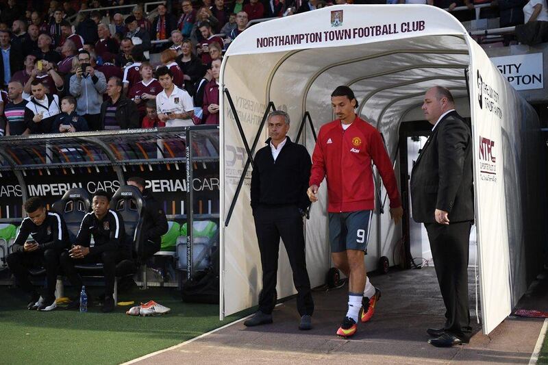 Manchester United manager Jose Mourinho and Zlatan Ibrahimovic make their way out of the tunnel. Shaun Botterill / Getty Images