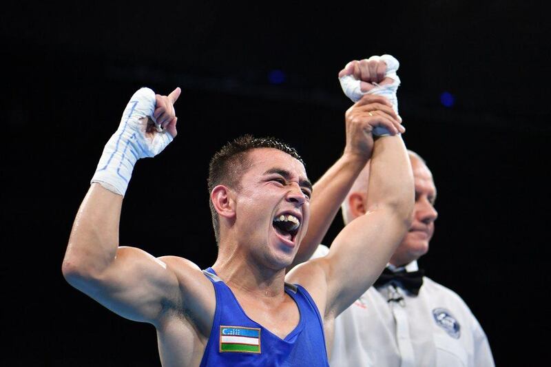 Uzbekistan’s Hasanboy Dusmatov celebrates winning against Colombia’s Yurberjen Herney Martinez during the boxing men’s light fly (46-49kg) final at the Rio 2016 Olympics at the Riocentro in Rio de Janeiro on August 14, 2016. Yuri Cortez / AFP
