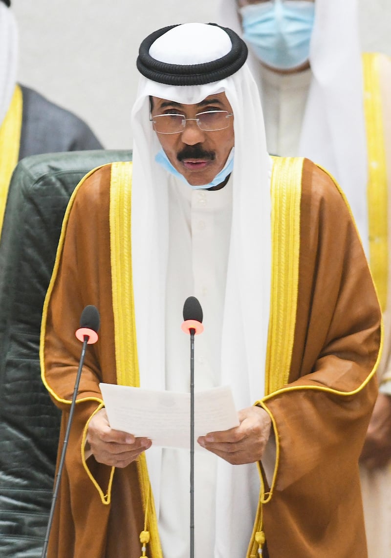 The new Emir of Kuwait Sheikh Nawaf Al Sabah performs the constitutional oath at the Kuwaiti National Assembly in Kuwait. AP Photo