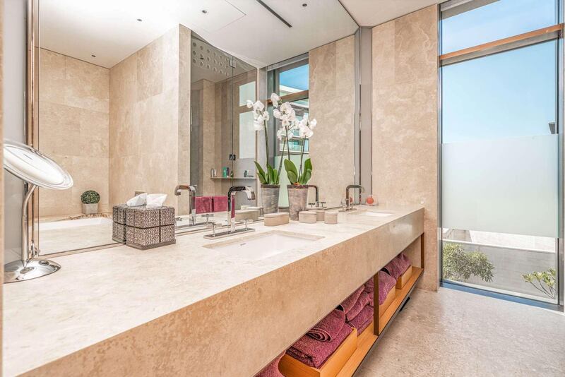 There's marble finishes in the bathrooms. Courtesy LuxuryProperty.com