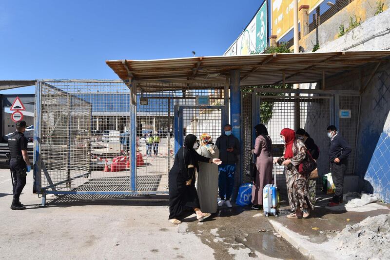 A group of Moroccan citizens stranded in Spain due to the coronavirus crisis, is not allowed to cross to their country as they don't have their papers in order in the Spanish enclave of Ceuta.   AFP