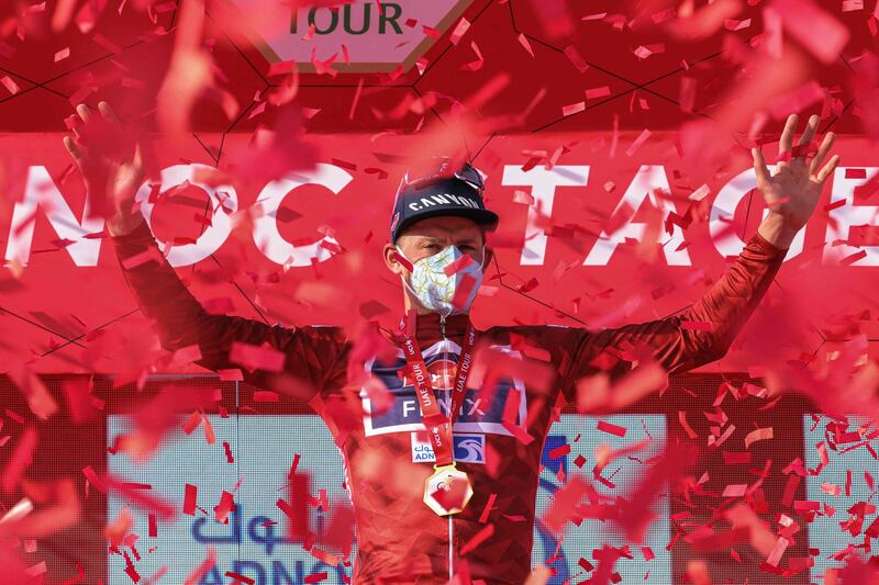 Dutch cyclist Mathieu van der Poel celebrates on the podium in Abu Dhabi after winning Stage 1 of the UAE Tour on February 21. AFP