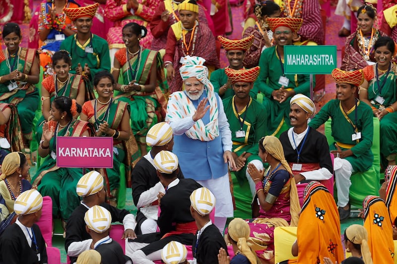 Mr Modi meets folk artists after addressing the nation on  Independence Day. Reuters