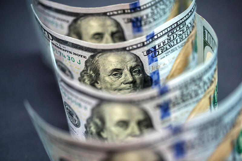 U.S. one-hundred dollar banknotes are arranged for a photograph in Hong Kong, China, on Monday, April 15, 2019. China's holdings of Treasury securities rose for a third month as the Asian nation took on more U.S. government debt amid the trade war between the world’s two biggest economies. Photographer: Paul Yeung/Bloomberg