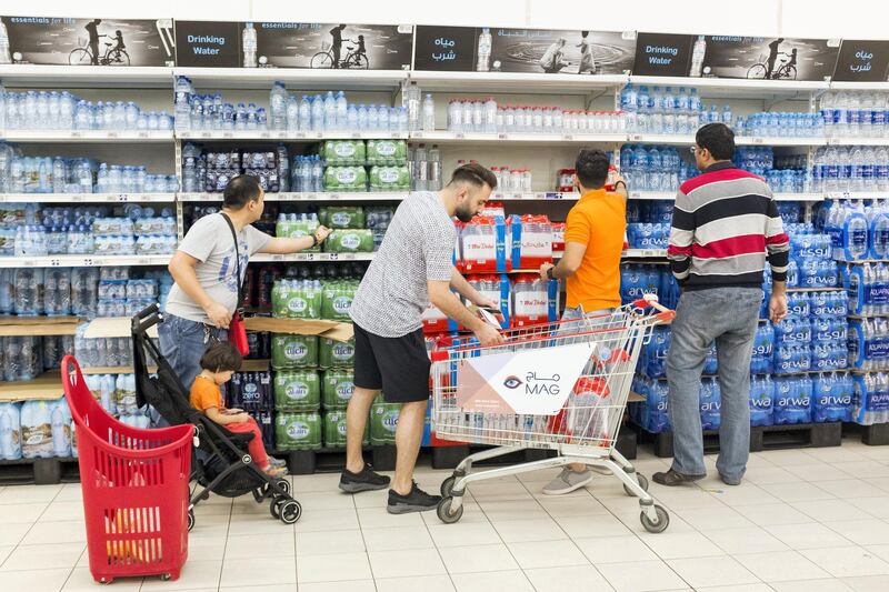 DUBAI, UNITED ARAB EMIRATES - DEC 31, 2017. 

Shoppers at Carrefour in Mall of the Emirates.

(Photo by Reem Mohammed/The National)

Reporter: Nick Webster

Section: NA