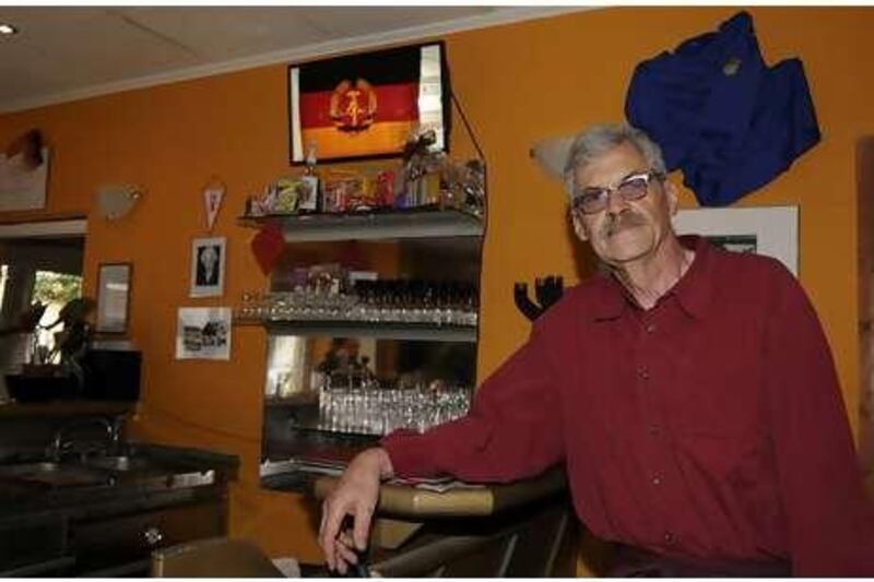 Willi Gau stands at the bar of "The Firm", his controversial Berlin pub.