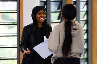 Rayaan Mahamoud celebrates her A-Level results at City of London College. Getty Images