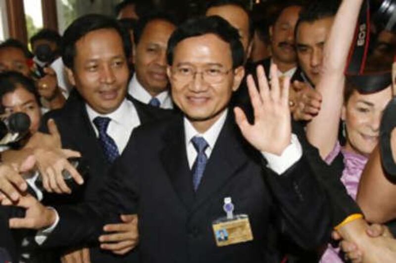 Somchai Wongsawat waves to cameras after being voted in as prime minister on Sept 17 2008.