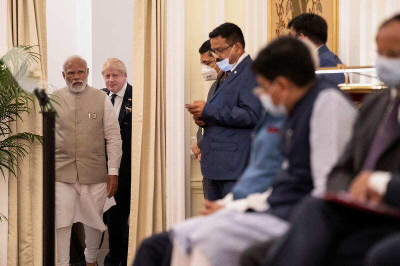 Narendra Modi arrives to address a joint press briefing with his Boris Johnson at Hyderabad House. Reuters