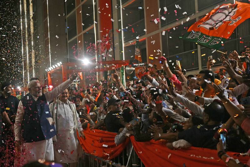 India's Prime Minister Narendra Modi arrives at the BJP headquarters in New Delhi on Tuesday. AFP