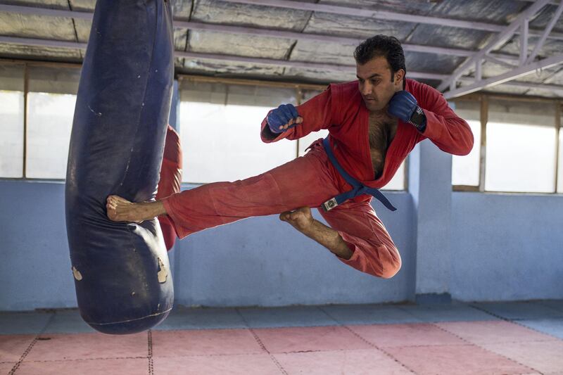 Sadam Chakari, who recently represented Afghanistan at the Asian Indoor and Martial Arts Games, is seen here practising Sambo, a Soviet martial art brought to Afghanistan during the Soviet occupation. Kern Hendricks
