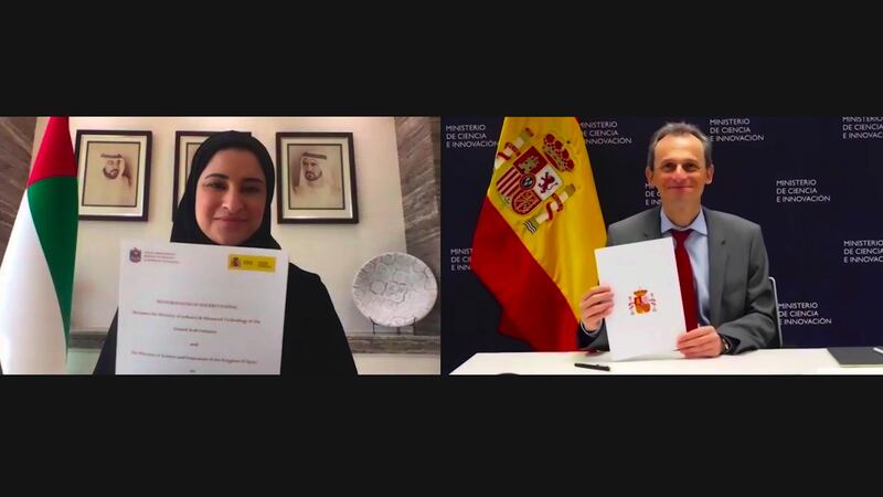 Sarah Al Amiri, UAE minister of state for advanced technology, and Pedro Duque, Spain‚Äôs minister of science and innovation, sign an agreement to develop an advanced technology framework on Saturday. Courtesy UAE ministry of industry and advanced technology 


