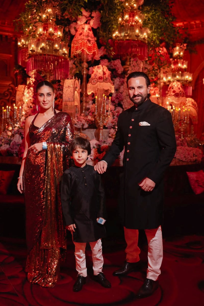 Actor Saif Ali Khan, his wife and actor Kareena Kapoor Khan and their son Taimur Ali pose during pre-wedding celebrations of Anant Ambani, son of Mukesh Ambani and Radhika Merchant, daughter of industrialist Viren Merchant, in Jamnagar, Gujarat, India, March 2, 2024.  Reliance Industries/Handout via REUTERS THIS IMAGE HAS BEEN SUPPLIED BY A THIRD PARTY.  NO RESALES.  NO ARCHIVES. 