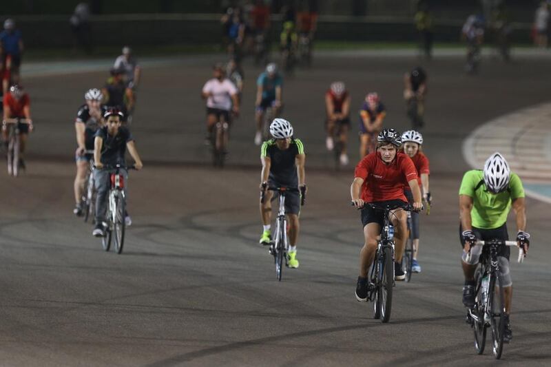 Cyclists of all ages were out on the track at Yas Marina Circuit on Tuesday night ahead of the Abu Dhabi Tour. Delores Johnson / The National