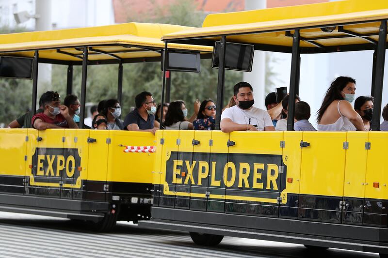 Visitors enjoying the ride in the EXPO Explorer train at the EXPO 2020 site in Dubai on 3 October, 2021. Pawan Singh/The National.