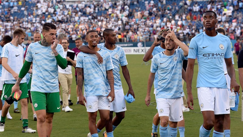 Manchester City players walk off the pitch after they defeated Tottenham in an International Champions Cup soccer match Saturday, July 29, 2017, in Nashville, Tenn. (AP Photo/Mark Zaleski)