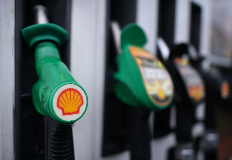 The logo of energy giant Royal Dutch Shell is pictured on pumps at a petrol station in London on January 30, 2018. / AFP PHOTO / BEN STANSALL