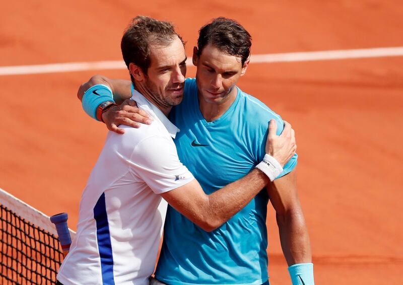 epa06780375 Rafael Nadal of Spain reacts with Richard Gasquet of France after winning their  their men’s third round match during the French Open tennis tournament at Roland Garros in Paris, France, 02 June 2018.  EPA/IAN LANGSDON