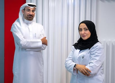 Dr Nawal Al Kaabi, chairwoman of the National Covid-19 Clinical Management Committee, and Dr Walid Zaher, vaccine project leader at G42 Healthcare. Victor Besa / The National