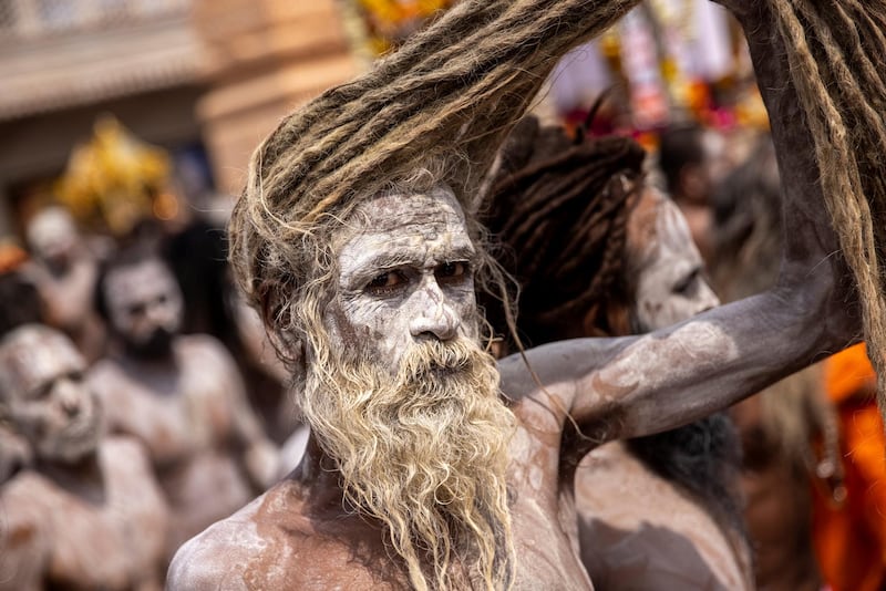 Naga Sadhus, or Hindu holy men, leave after taking a dip in the Ganges river during Shahi Snan at Kumbh Mela. Reuters