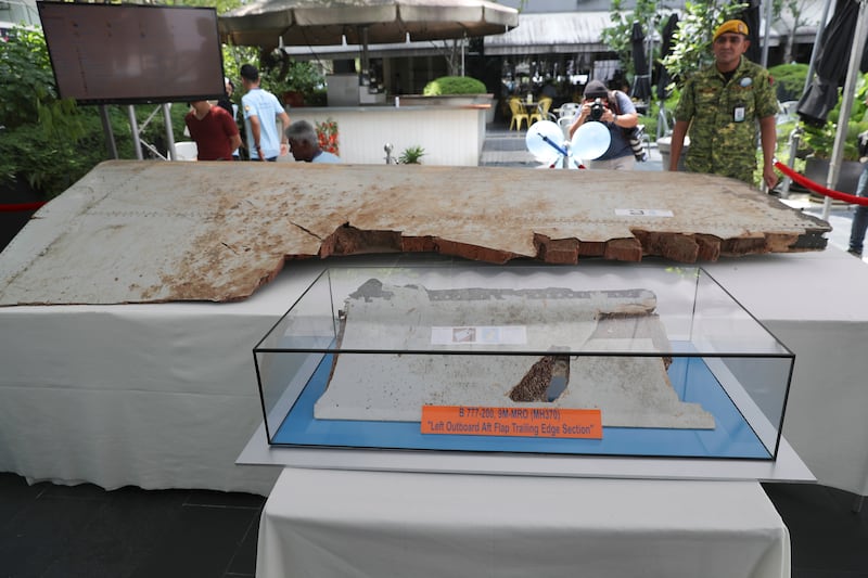 Debris displayed during a Day of Remembrance for MH370 event in Kuala Lumpur on March 3, 2019. AP