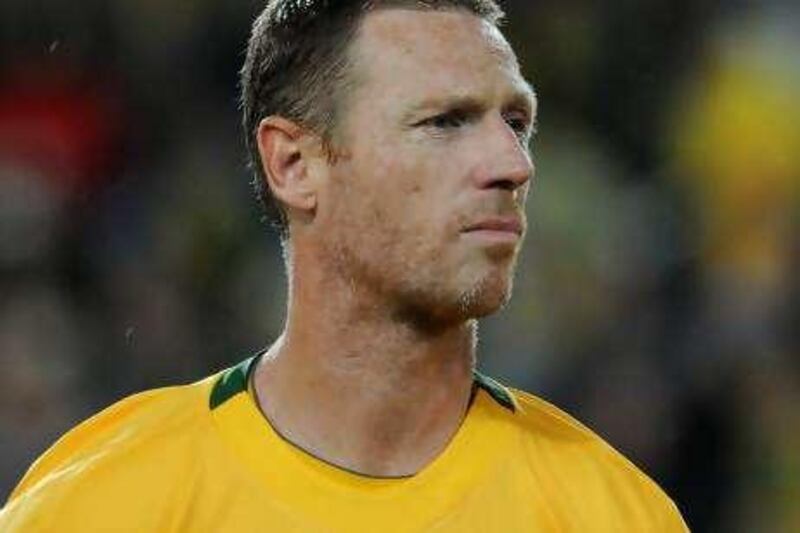 Craig Moore of Australia waits prior to the start of the international football friendly against the Netherlands in Sydney on October 10, 2009.  AFP PHOTO / Greg WOOD