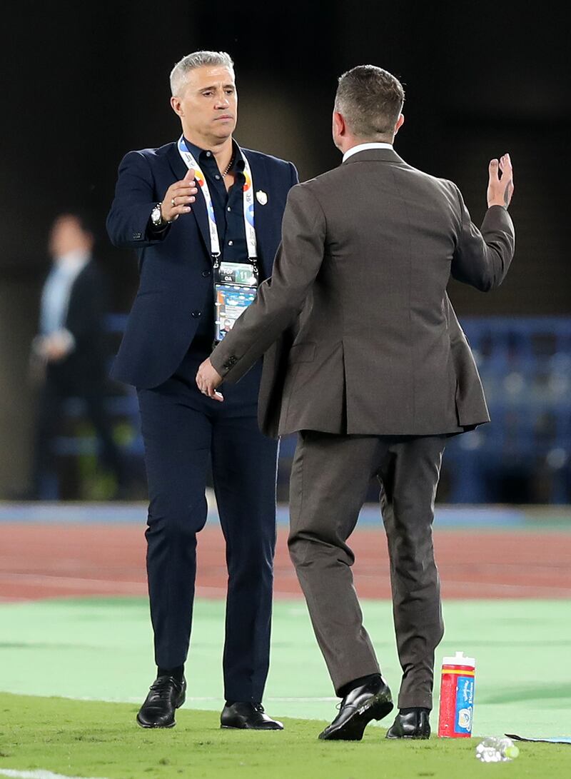 Al Ain manager Hernan Crespo and Yokohama coach Harry Kewell shake hands at full time. Chris Whiteoak / The National