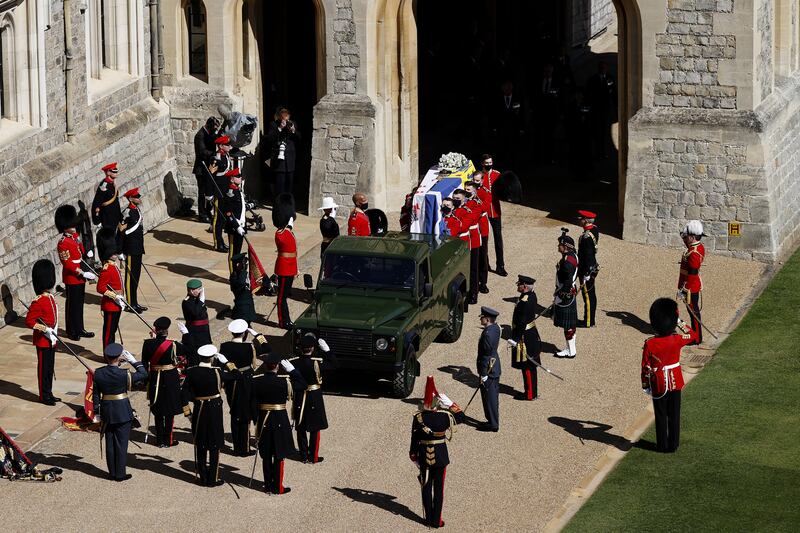 Prince Philip, The Duke of Edinburgh’s coffin is carried to the purpose-built Land Rover during his funeral at Windsor Castle in 2021