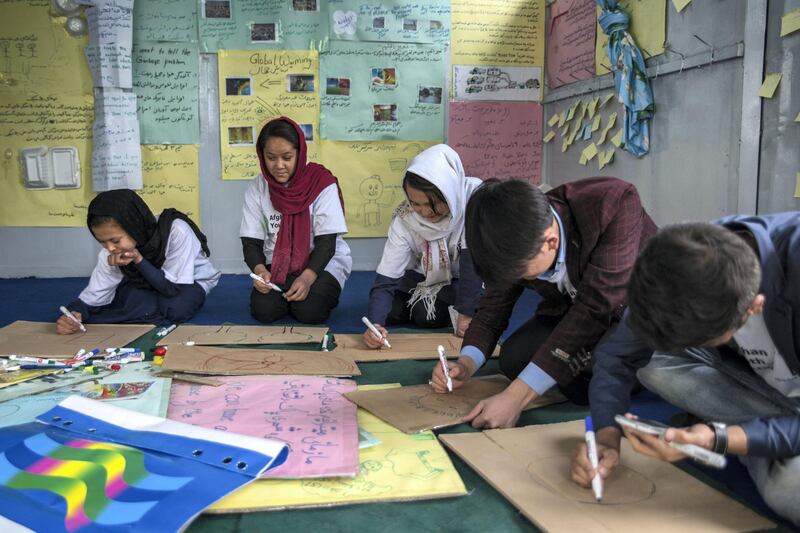 Climate change activists prepare for a prostest in Kabul. 